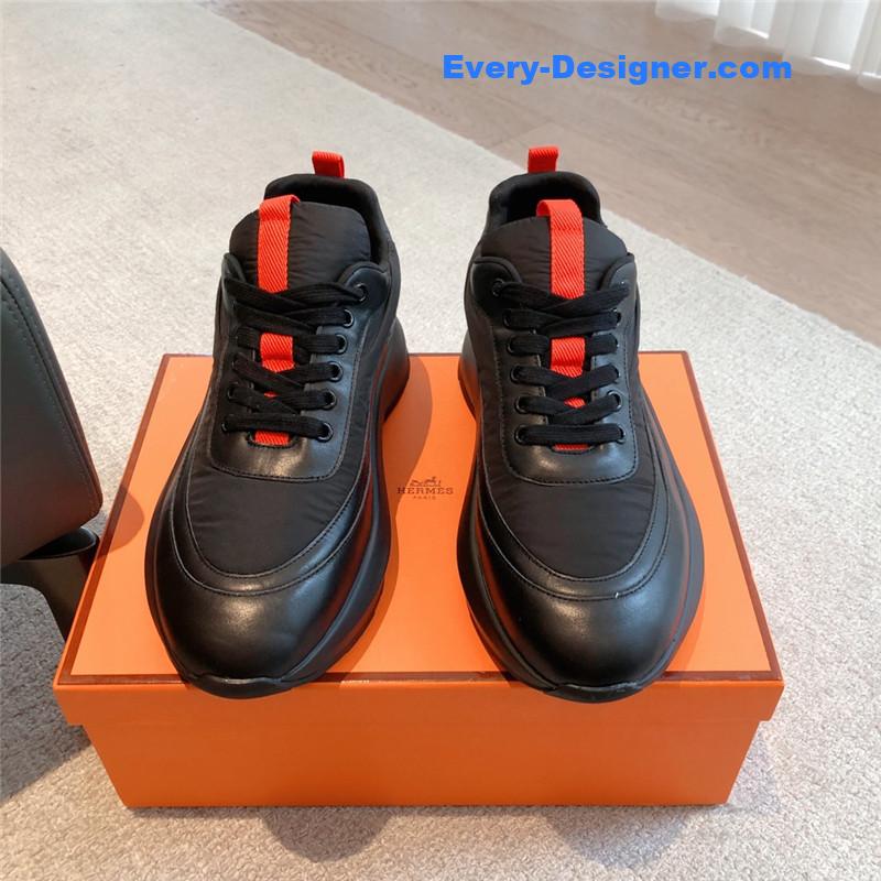 H**me5 black orange bouncing sneakers