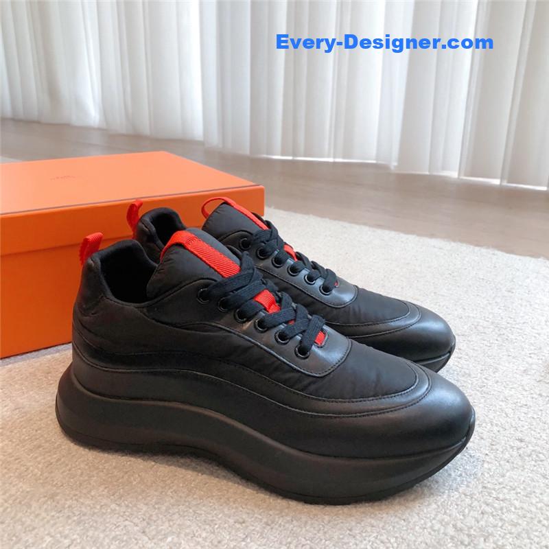 H**me5 black orange bouncing sneakers