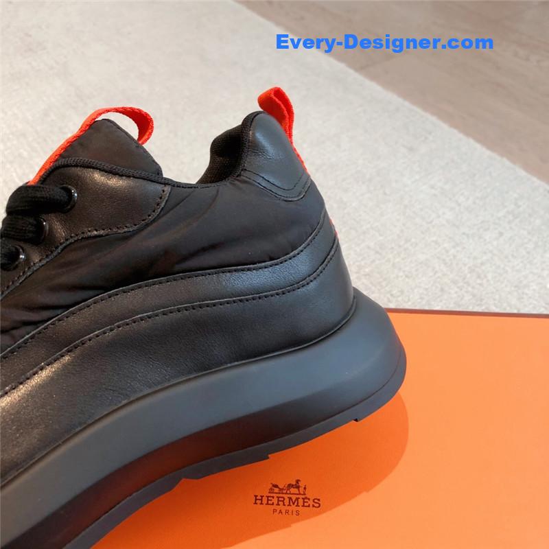 H**me5 black orange bouncing sneakers
