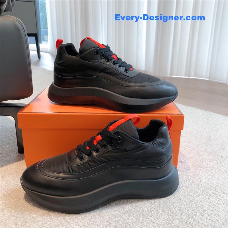 H**me5 black orange bouncing sneakers