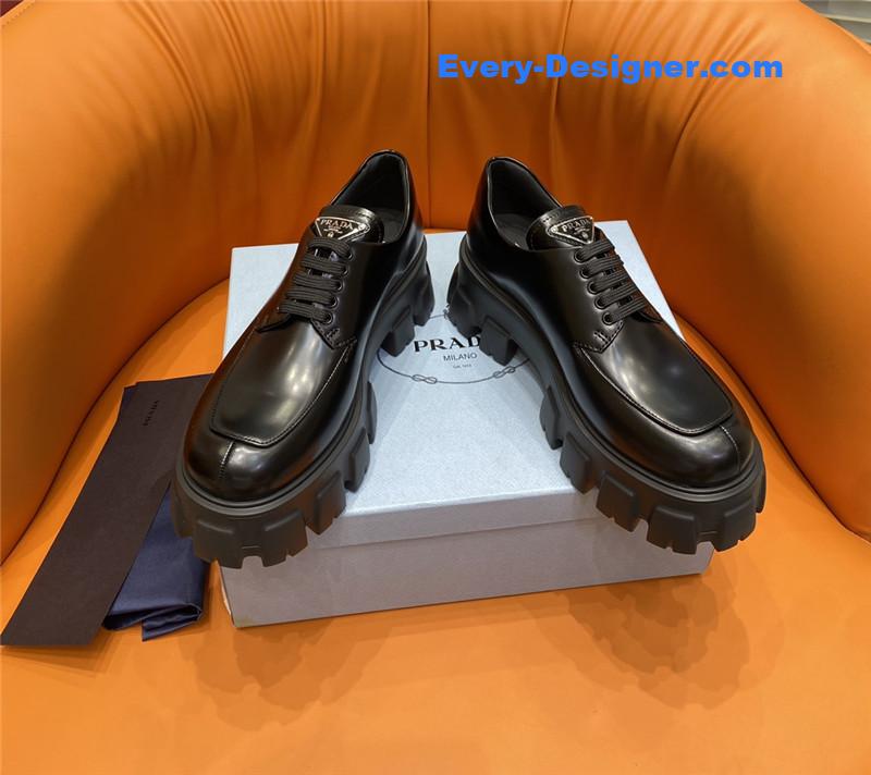prada triangle logo lace-up loafers