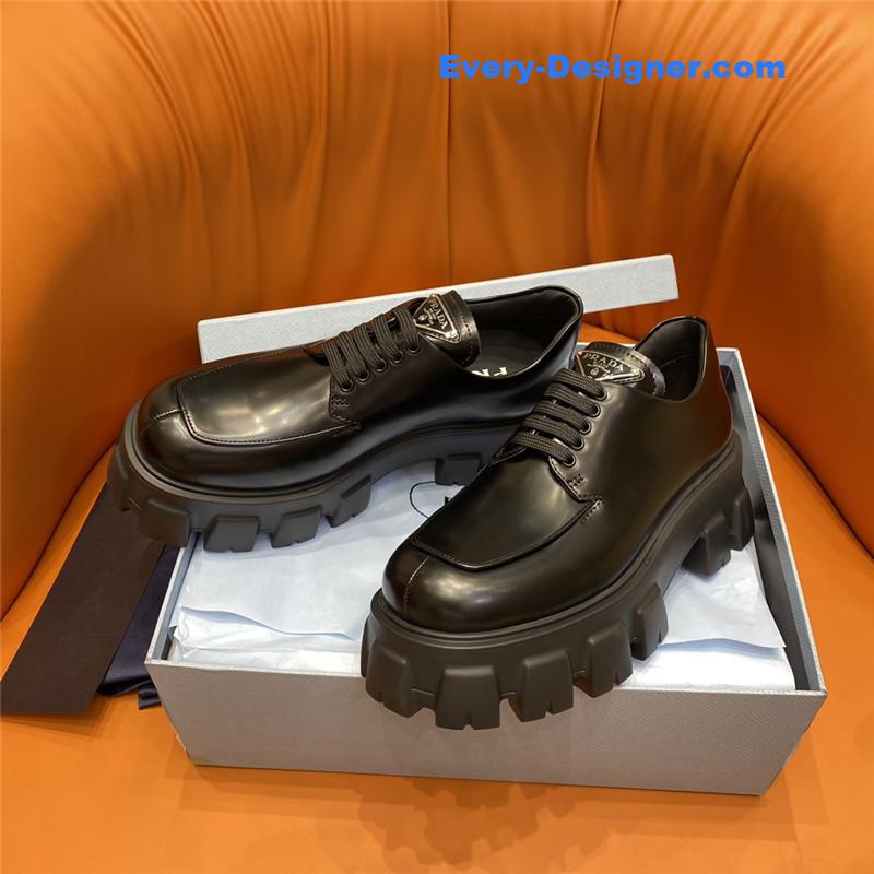 prada triangle logo lace-up loafers