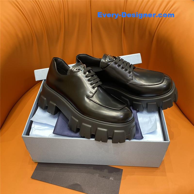 prada triangle logo lace-up loafers