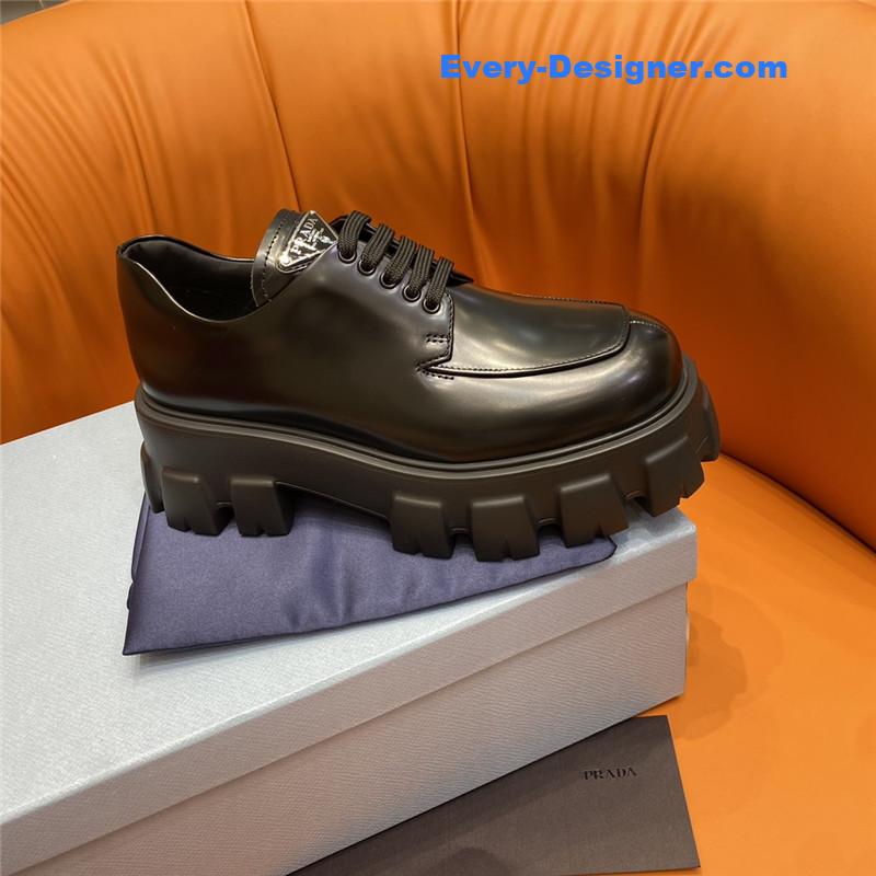 prada triangle logo lace-up loafers