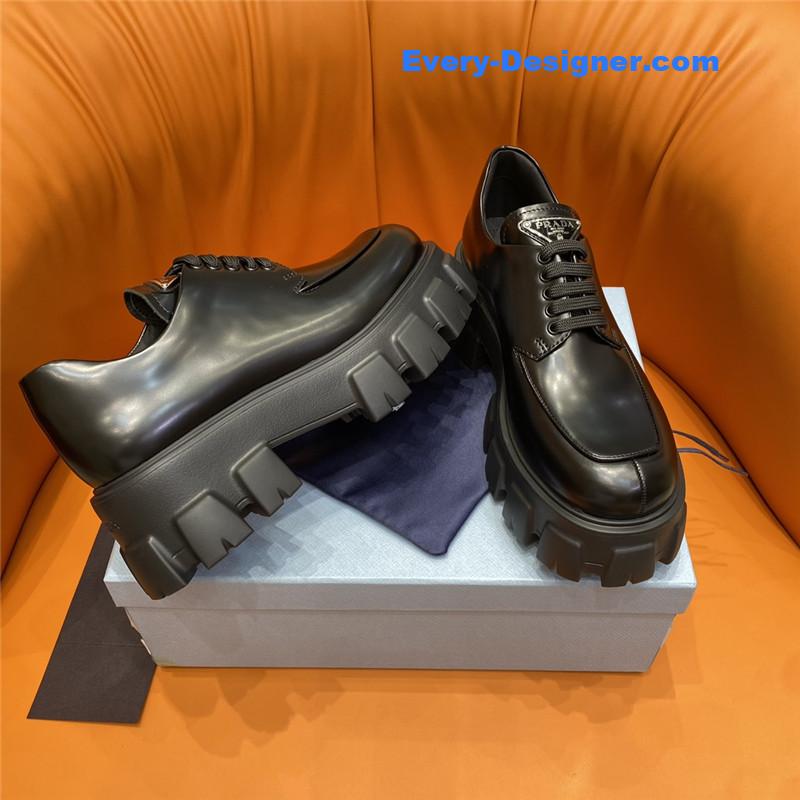 prada triangle logo lace-up loafers