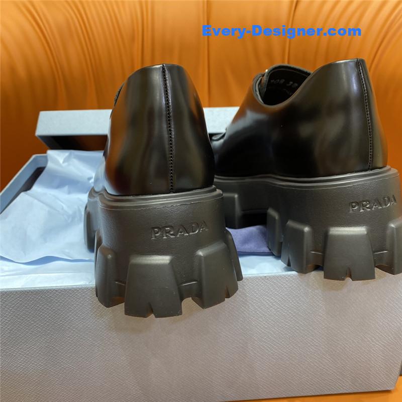 prada triangle logo lace-up loafers