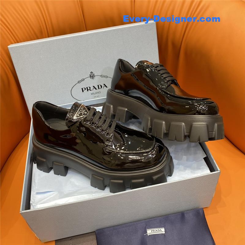 prada triangle logo lace-up loafers