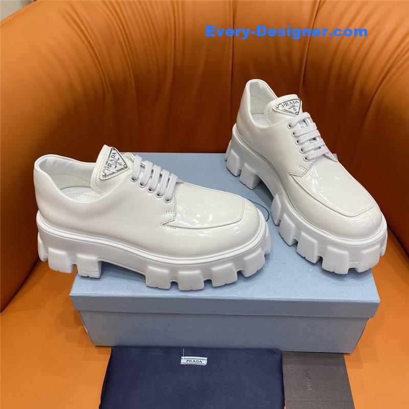 prada triangle logo lace-up loafers