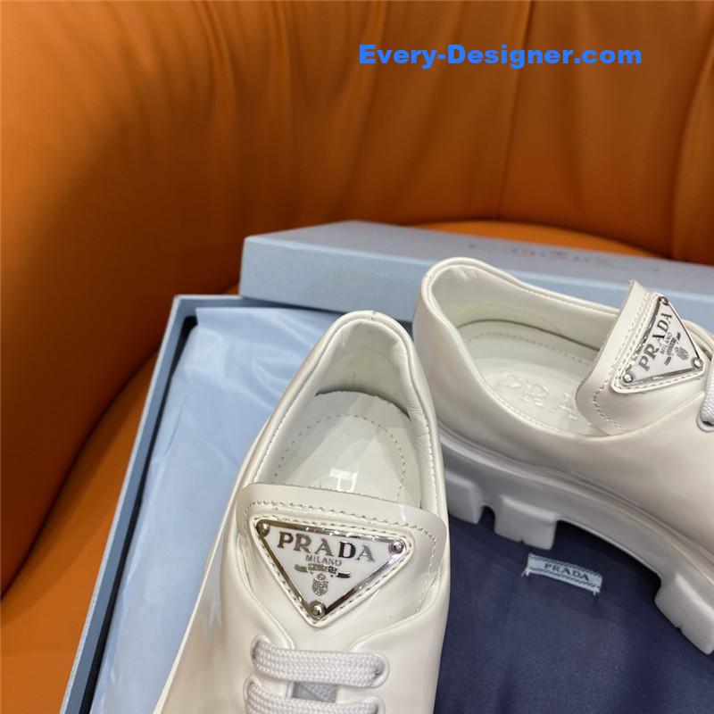 Pra*a triangle logo lace-up loafers