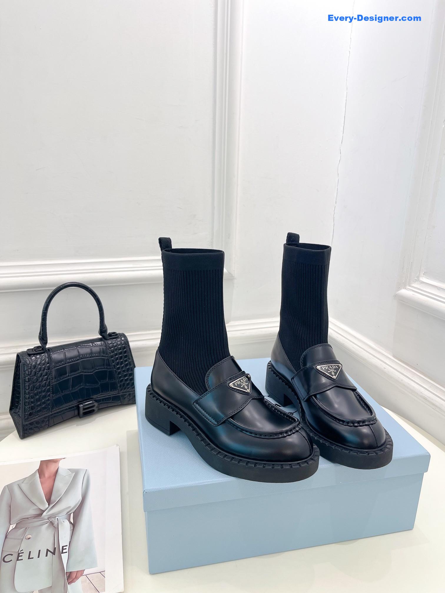 prada catwalk style thick-soled triangle logo socks ankle boots