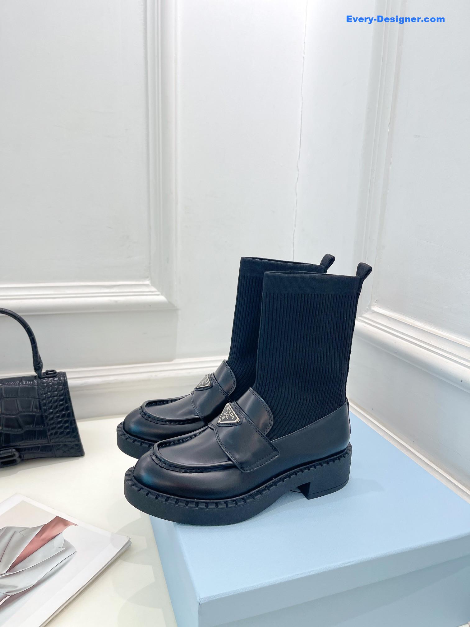 Pra*a catwalk style thick-soled triangle logo socks ankle boots