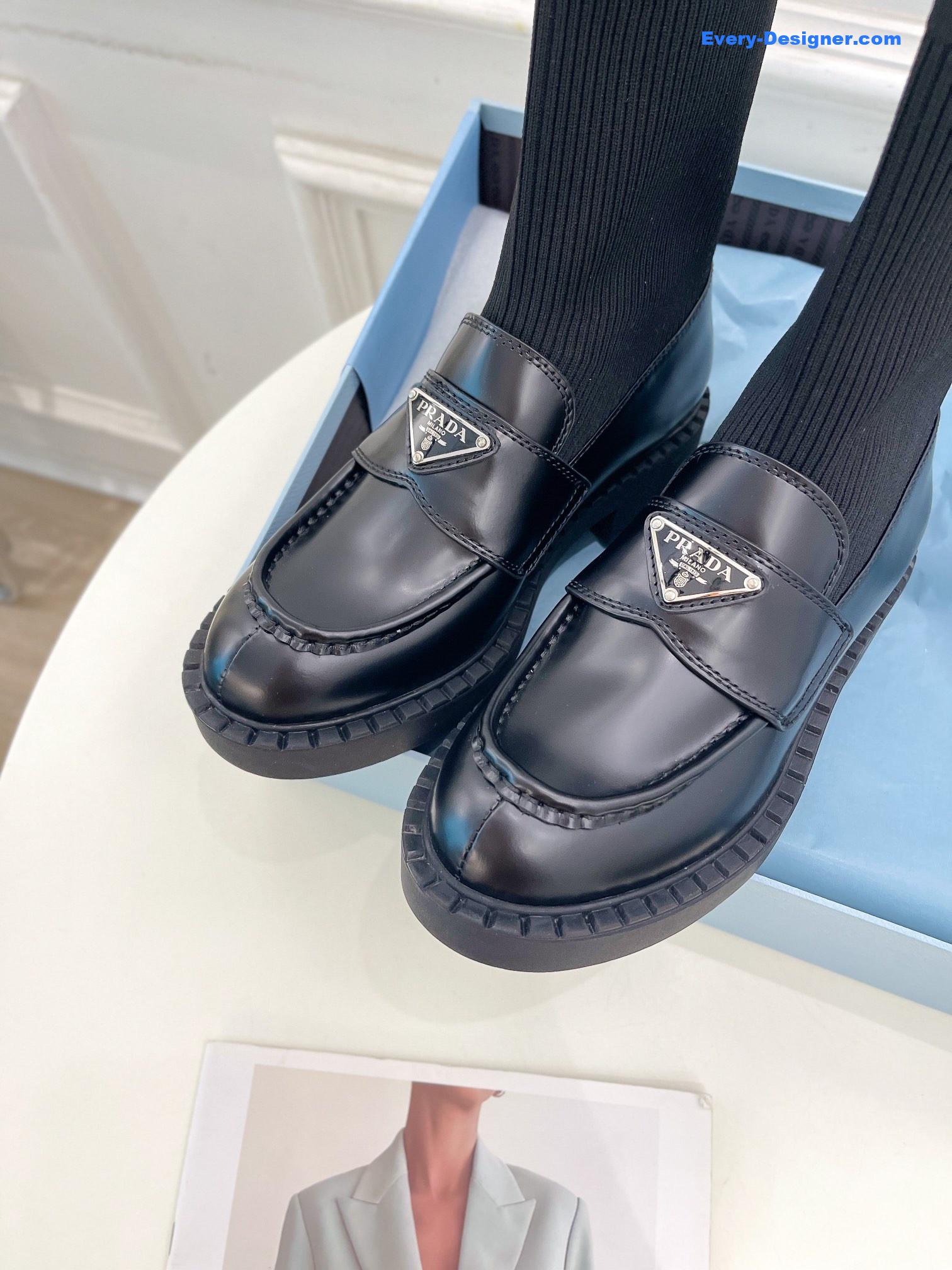 Pra*a catwalk style thick-soled triangle logo socks ankle boots