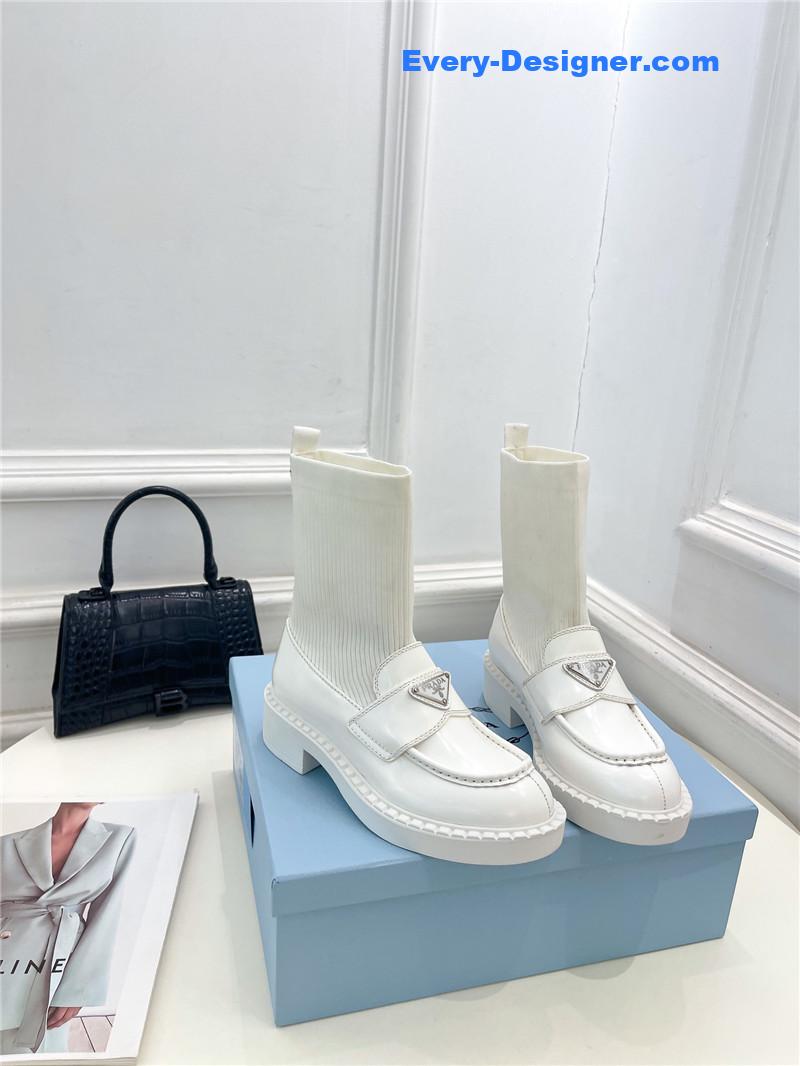 prada catwalk style thick-soled triangle logo socks ankle boots