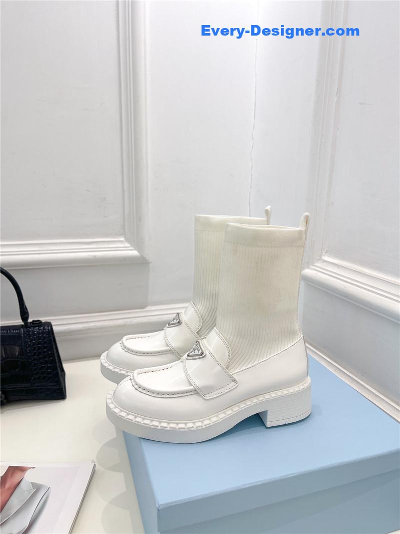 Pra*a catwalk style thick-soled triangle logo socks ankle boots