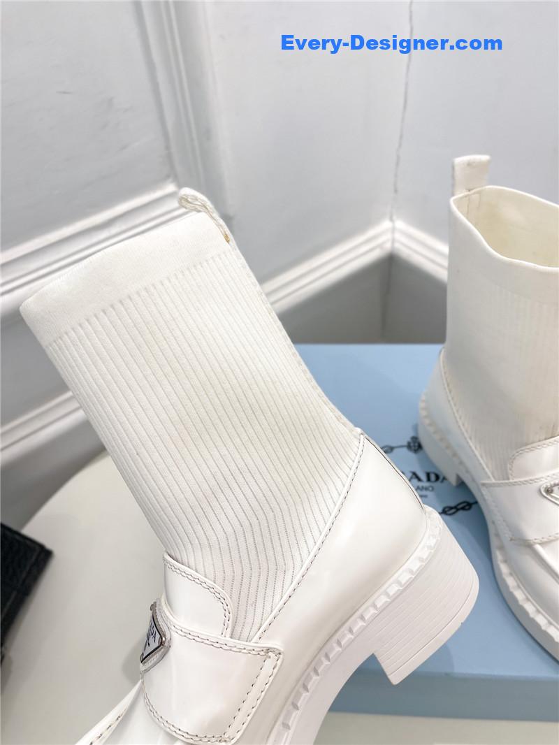 Pra*a catwalk style thick-soled triangle logo socks ankle boots