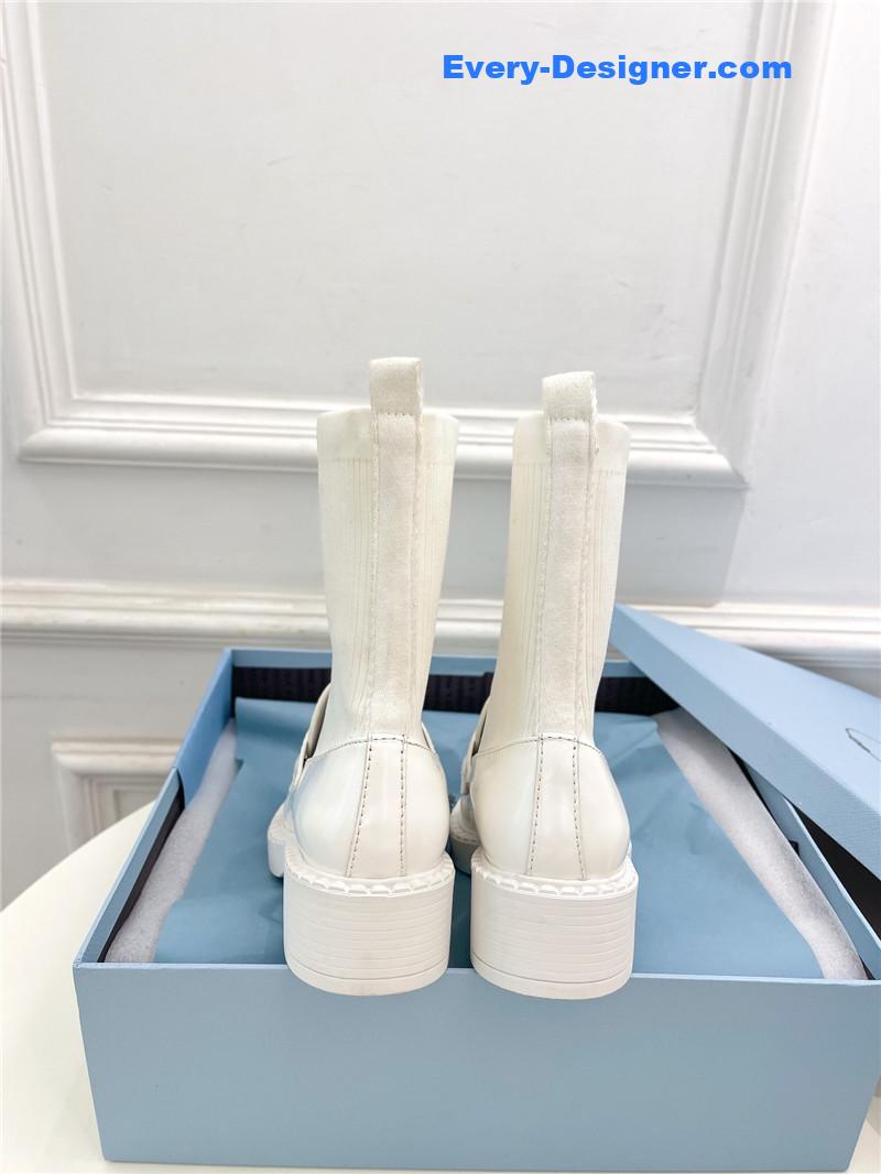 Pra*a catwalk style thick-soled triangle logo socks ankle boots