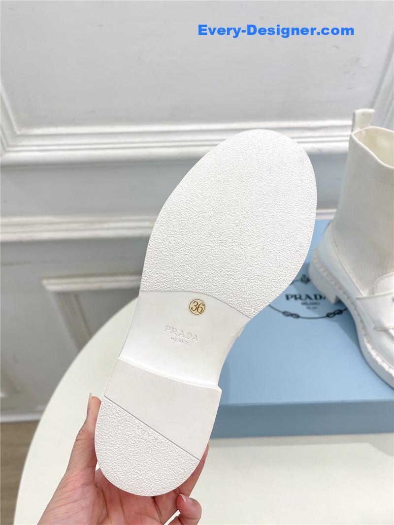 Pra*a catwalk style thick-soled triangle logo socks ankle boots