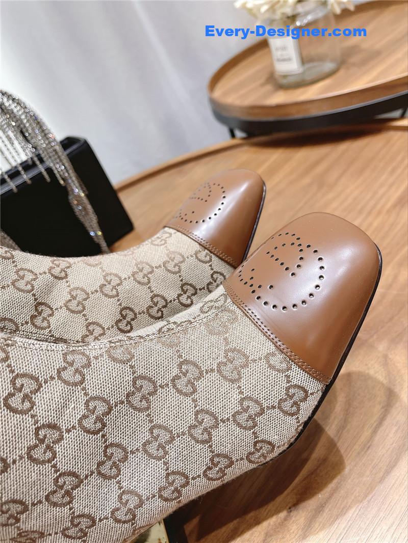 Gucci side buckle boots