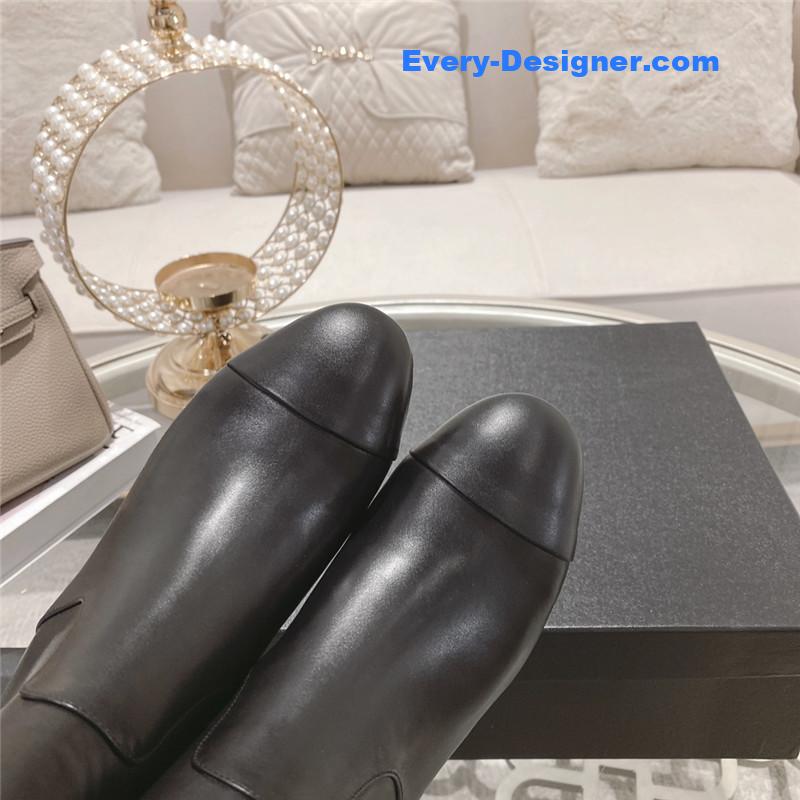 Ch**el black round toe calfskin ankle boots