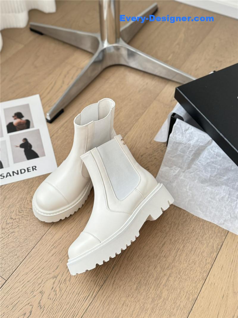 Ch**el white calfskin cap toe ankle boots