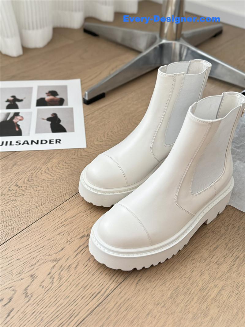 Ch**el white calfskin cap toe ankle boots