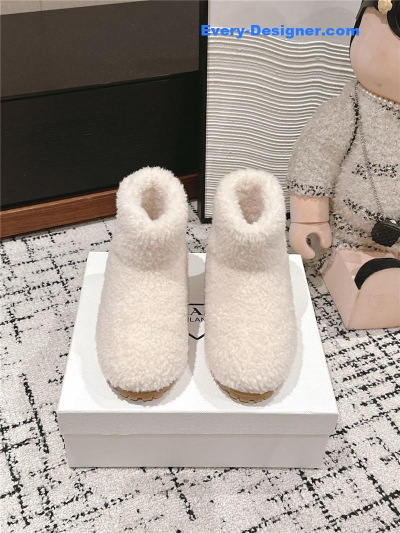 Pra*a white shearling booties
