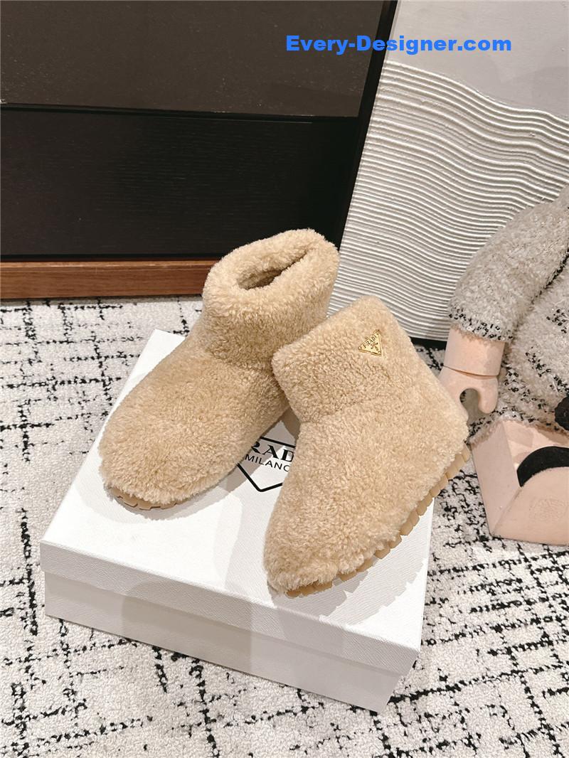 Pra*a shearling booties beige