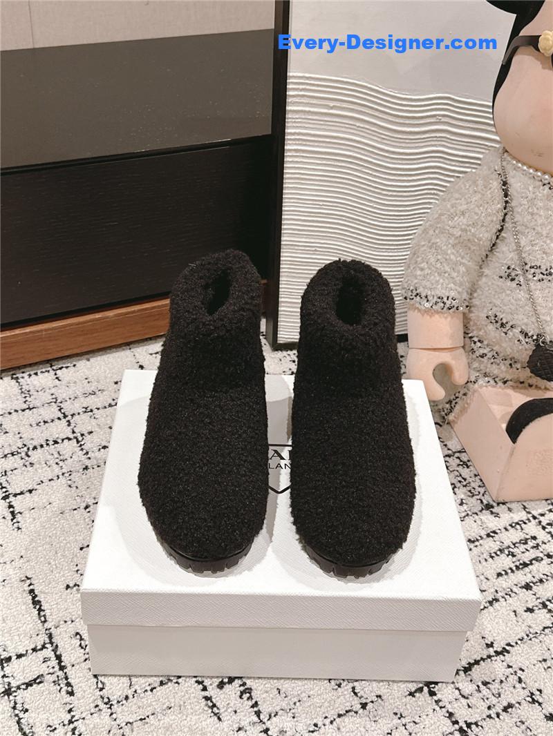 Pra*a black shearling booties