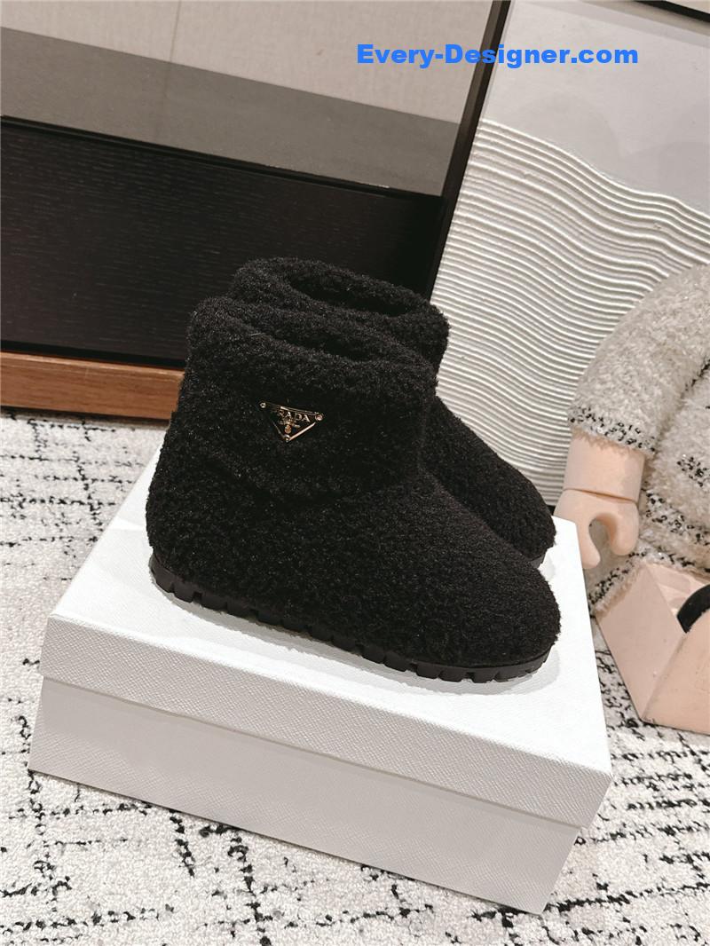 Pra*a black shearling booties