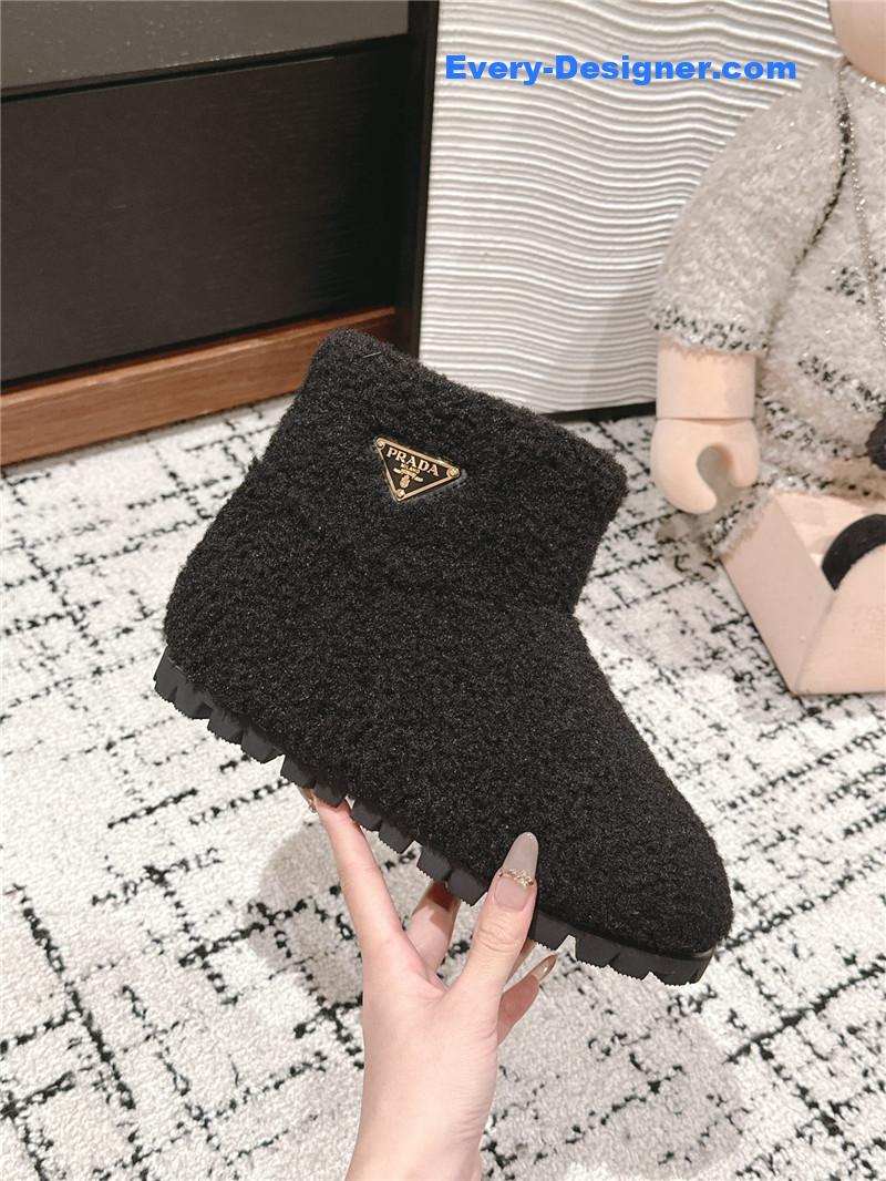 Pra*a black shearling booties