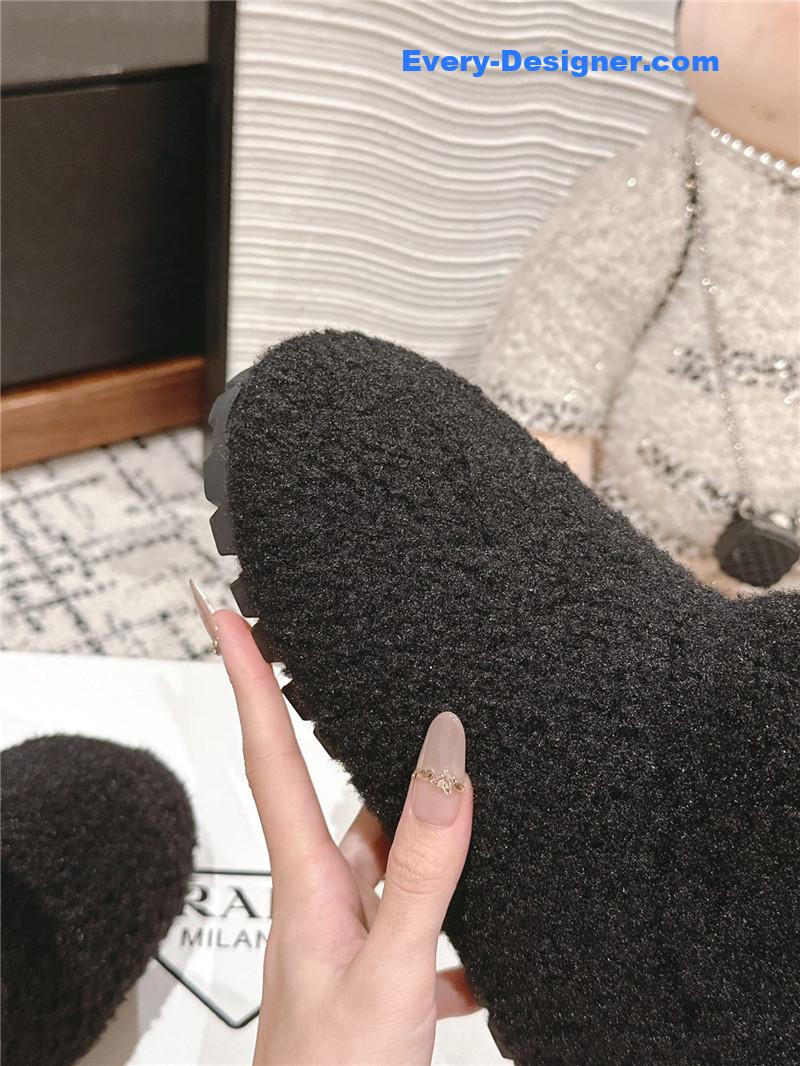 Pra*a black shearling booties