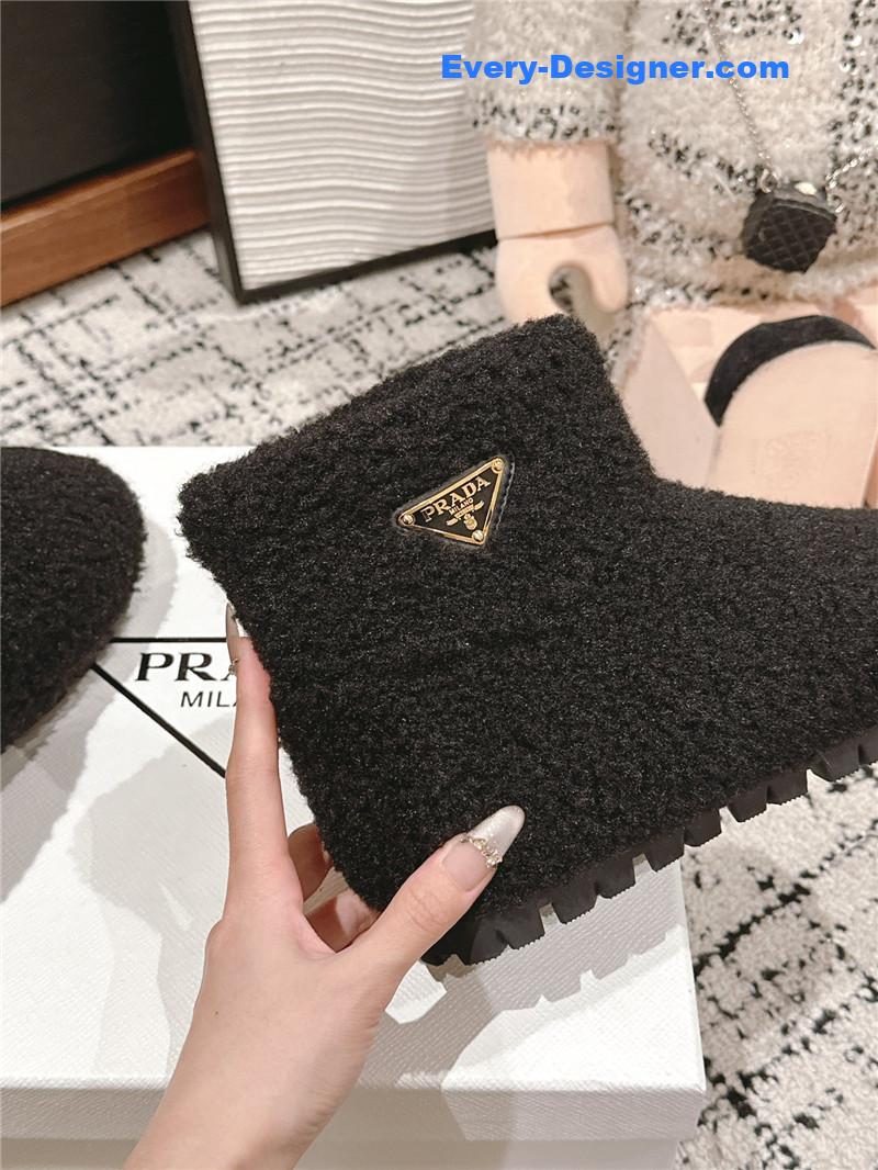Pra*a black shearling booties