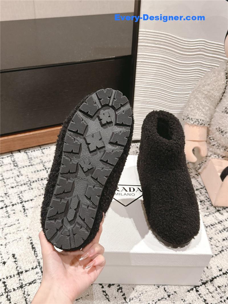 Pra*a black shearling booties