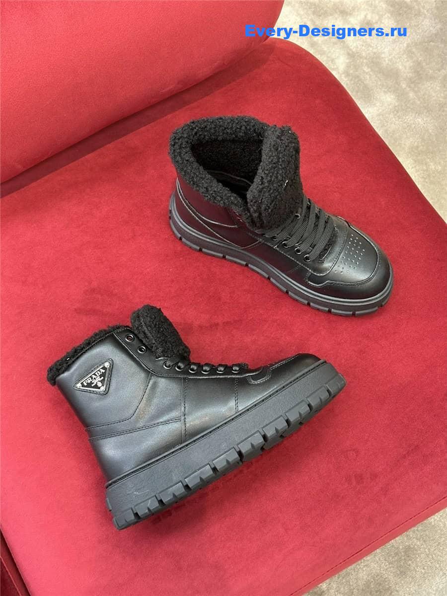 Pra*a triangle-logo high-top leather sneakers