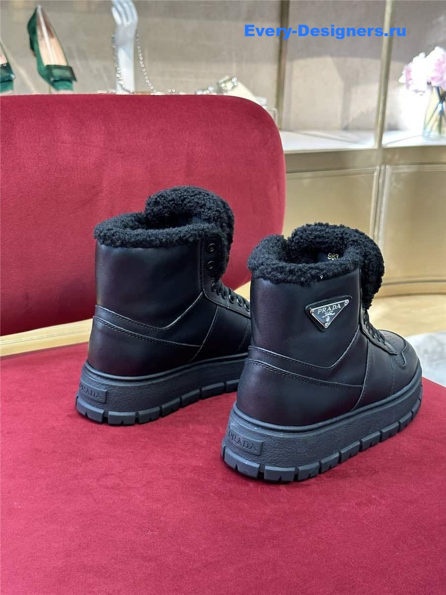 Pra*a triangle-logo high-top leather sneakers