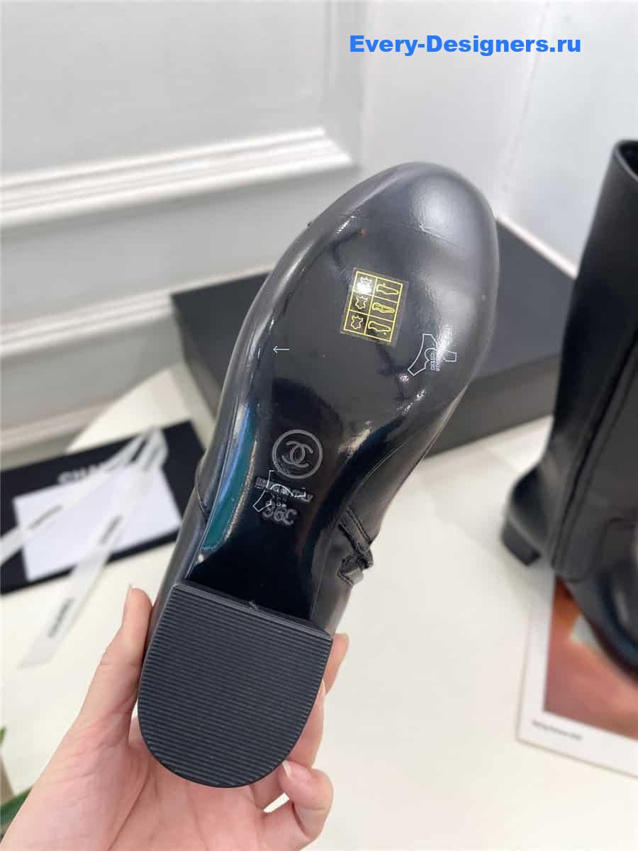 Ch**el black leather heeled boots