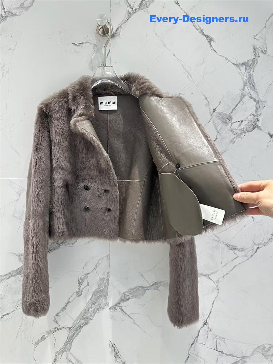 M1um1u long hair lapel sheepskin fur coat