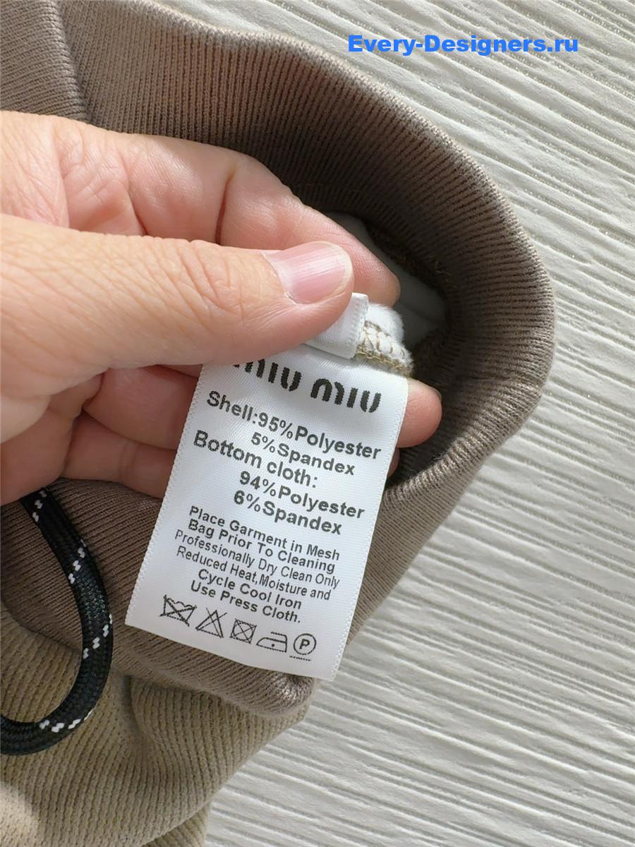 M1um1u new wide-leg trousers