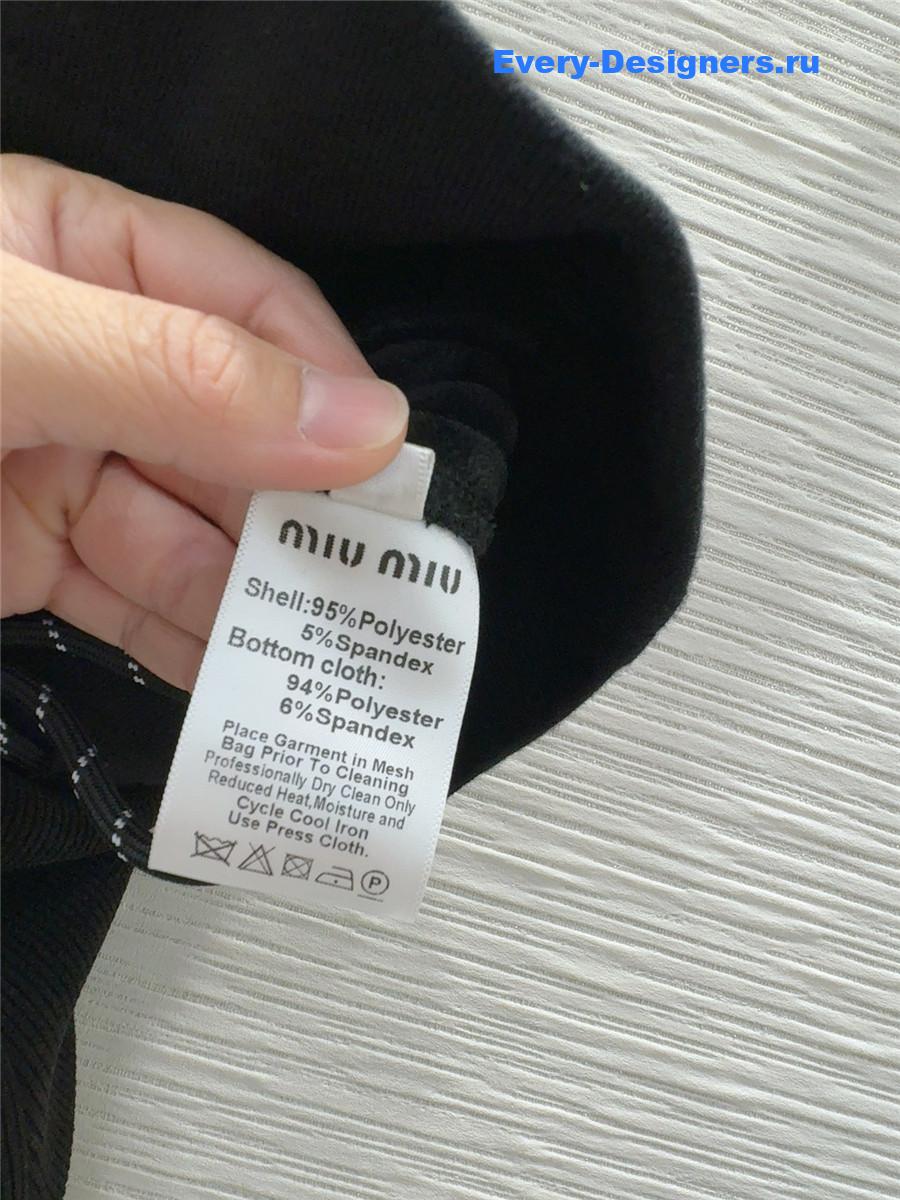 M1um1u new wide-leg trousers