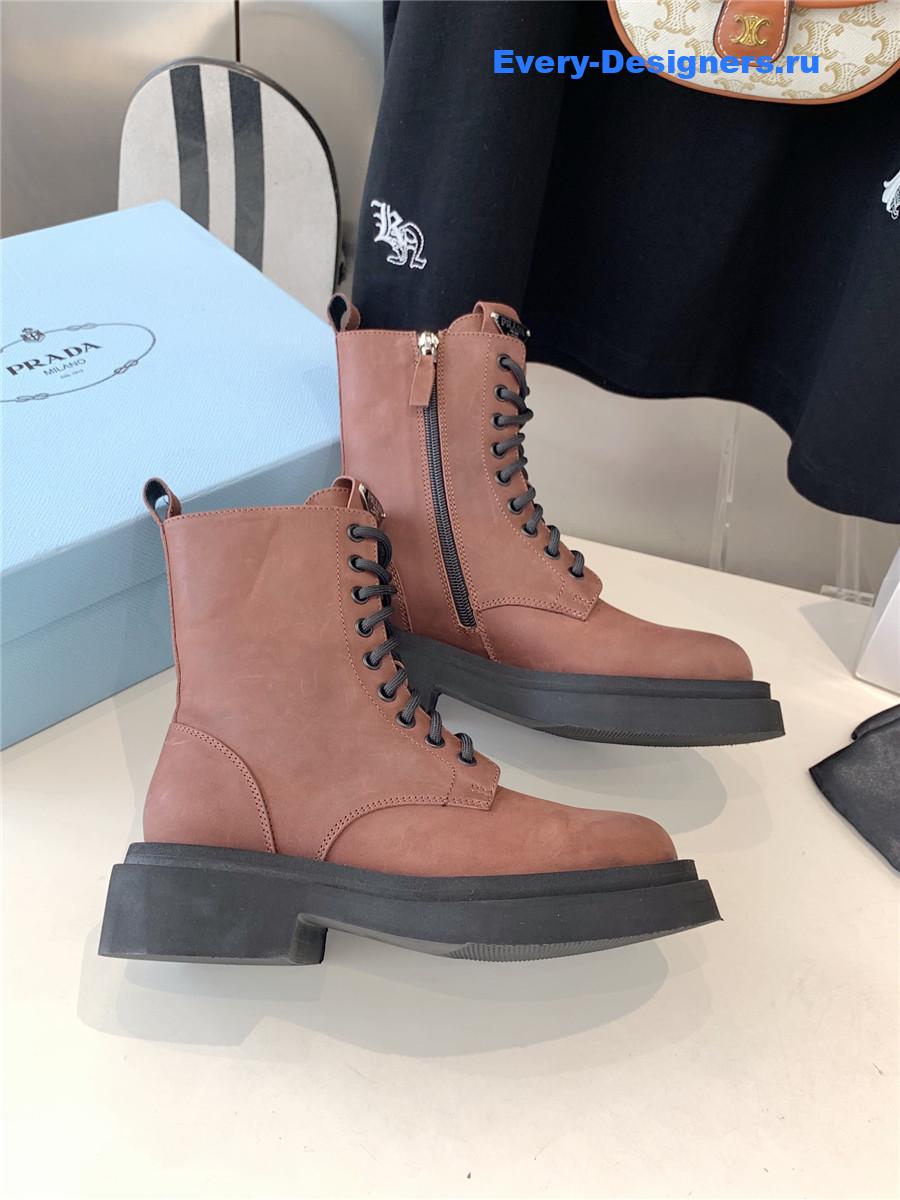 Pra*a calfskin triangle logo brown high top boots