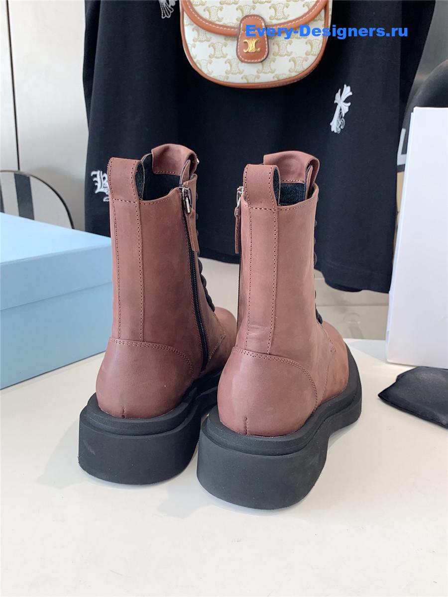 Pra*a calfskin triangle logo brown high top boots