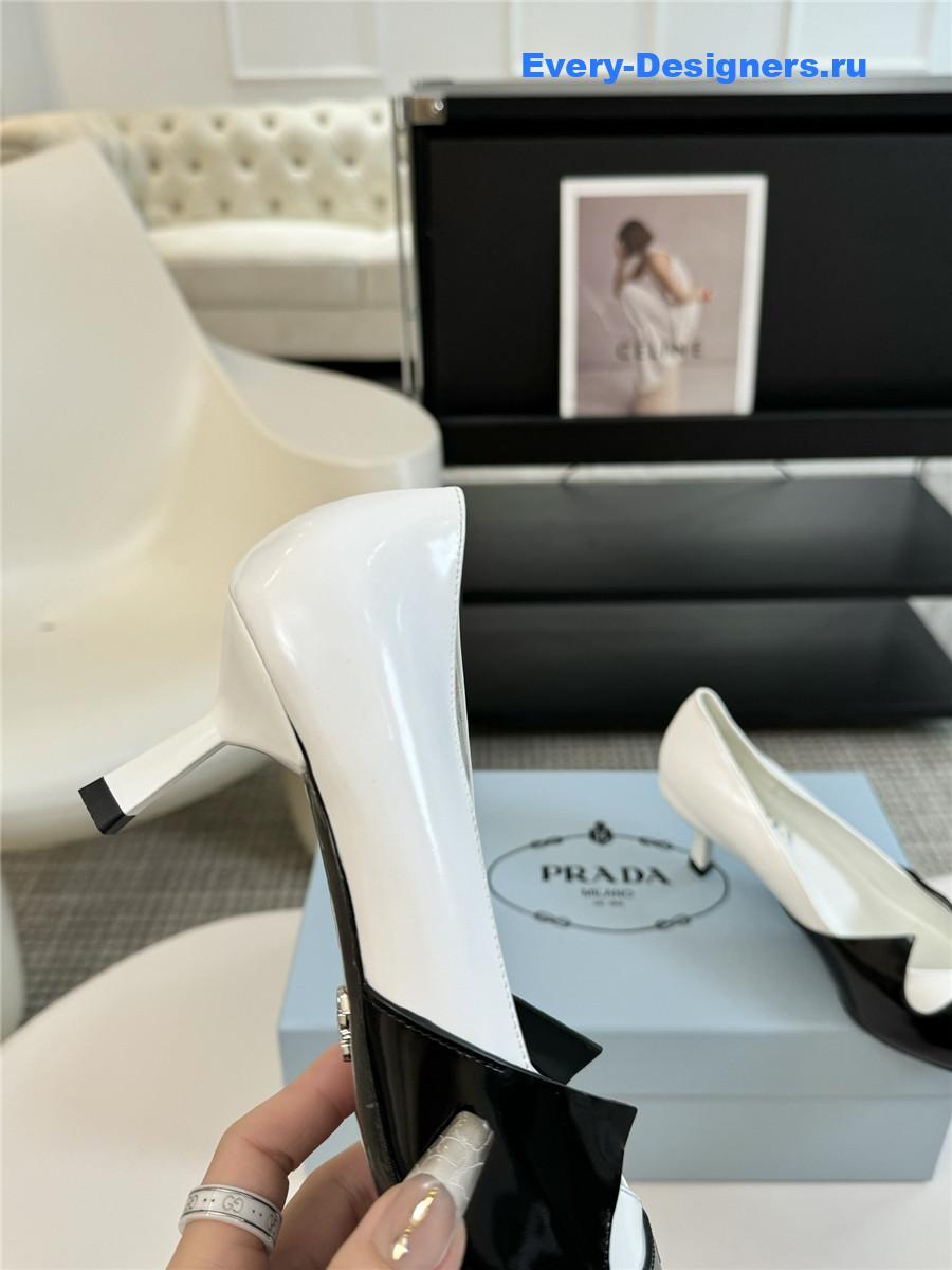 Pra*a smooth leather pumps black/white