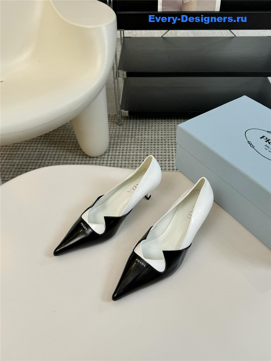 Pra*a smooth leather pumps black/white