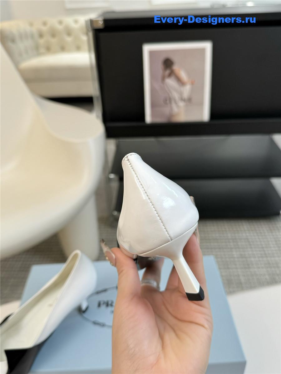 Pra*a smooth leather pumps black/white