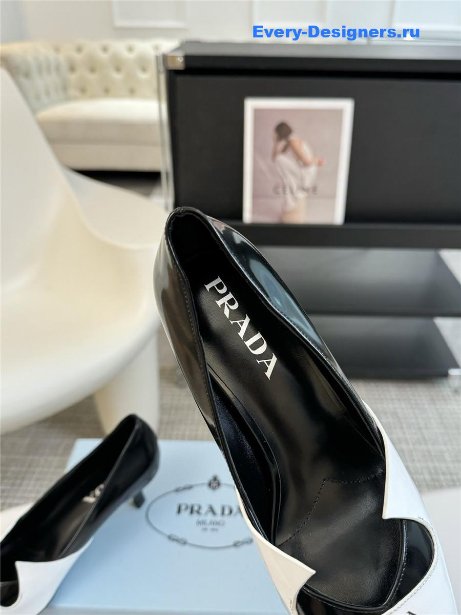Pra*a smooth leather pumps in white/black