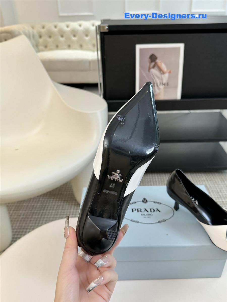 Pra*a smooth leather pumps in white/black