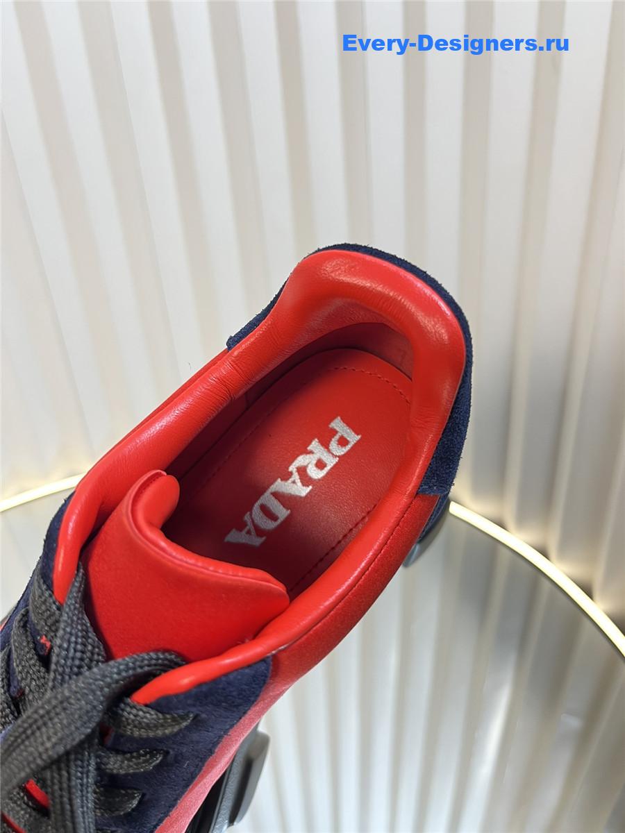 Pra*a suede low top platform sneakers orange/navy