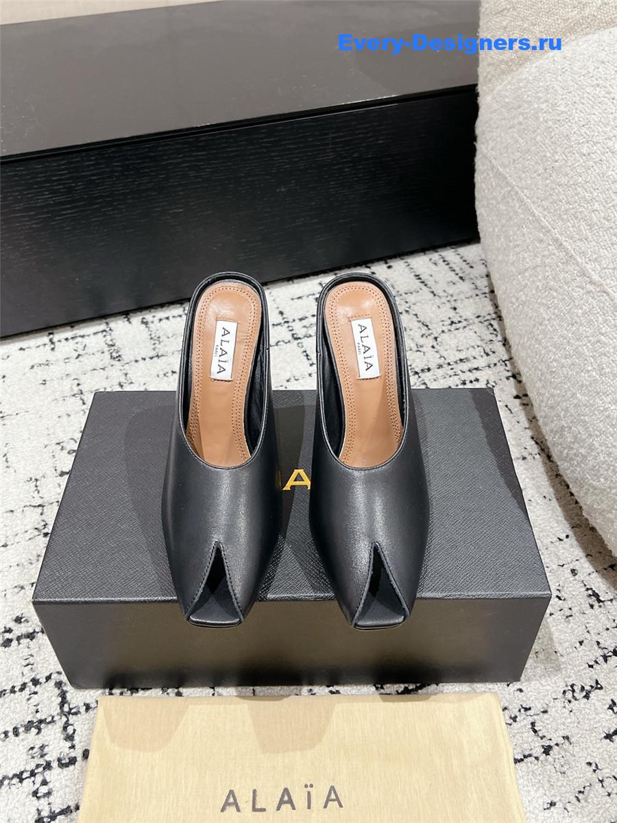 Alaia Black Spike Mules in Calfskin