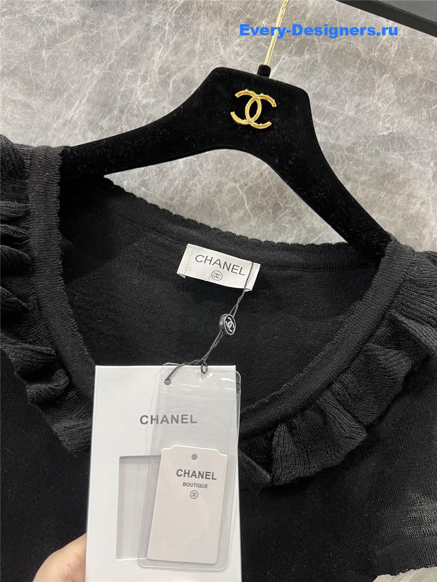 Ch**el black crew neck knit top