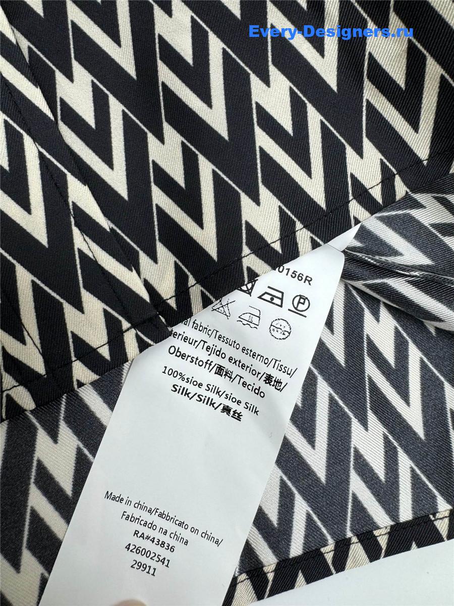Va1e*ntin0 garavani toute la v silk shirt